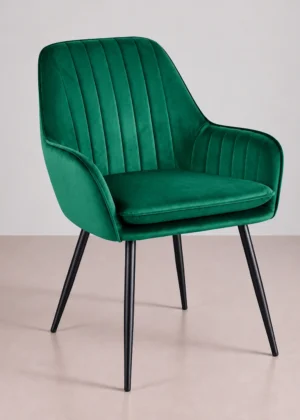 Silla de terciopelo verde con patas negras